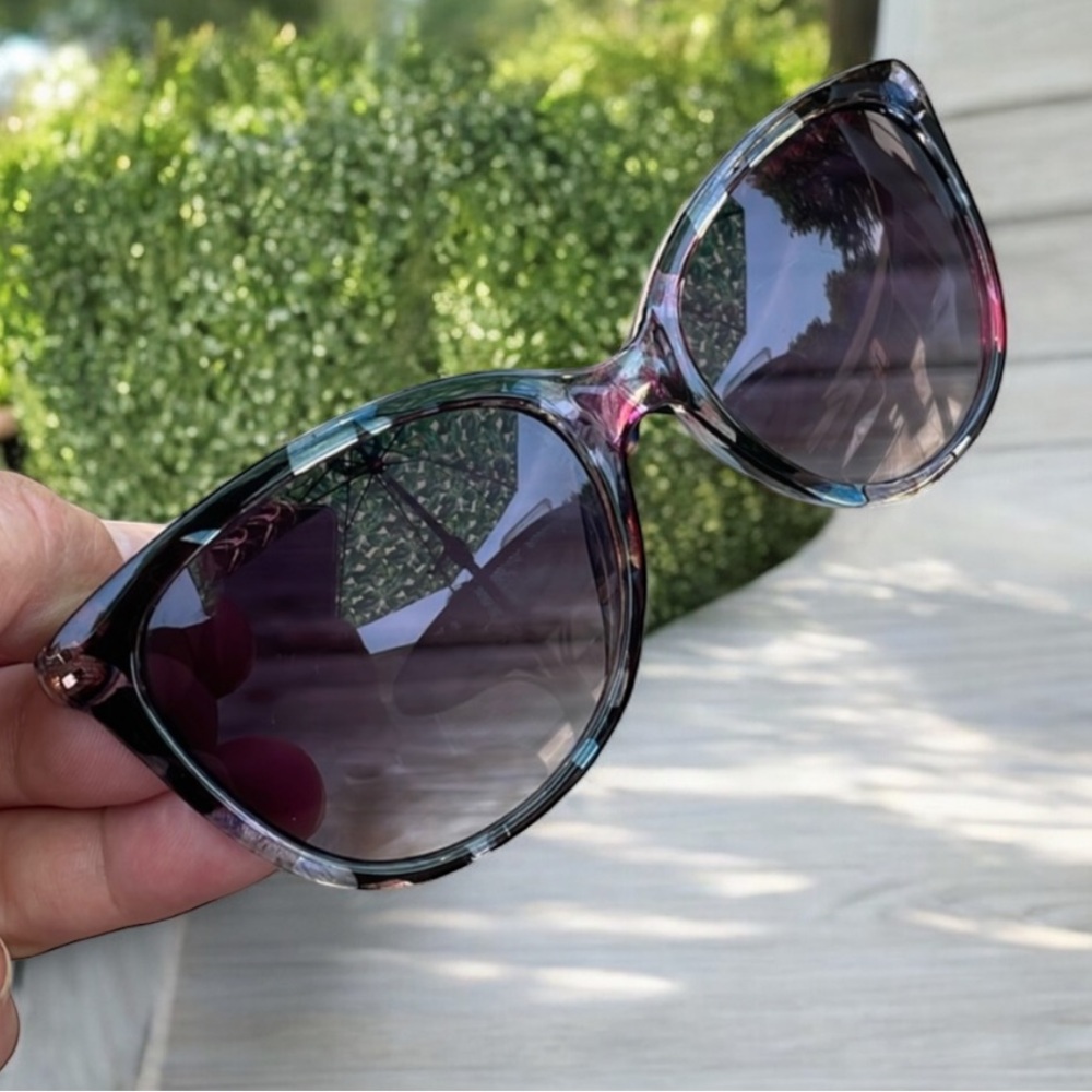Sunglasses with a strap holder